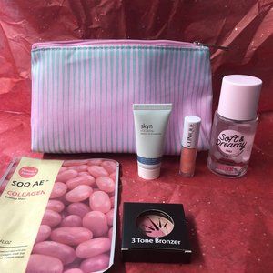 Striped Clinique Bag w/ mixed beauty products